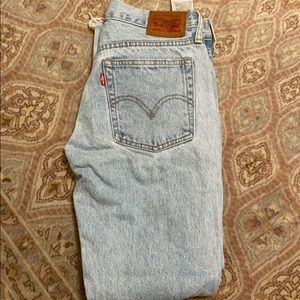 Blue jeans from Levi’s. Distressed